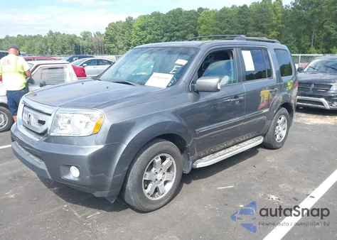 2011 Honda Pilot Touring из США, поврежденный, VIN 5FNYF4H96BB024397